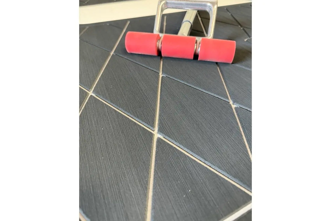J-roller being used to install AquaGrip EVA foam boat flooring