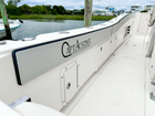 AquaGrip EVA foam coaming bolsters installed on center console boat - teak design