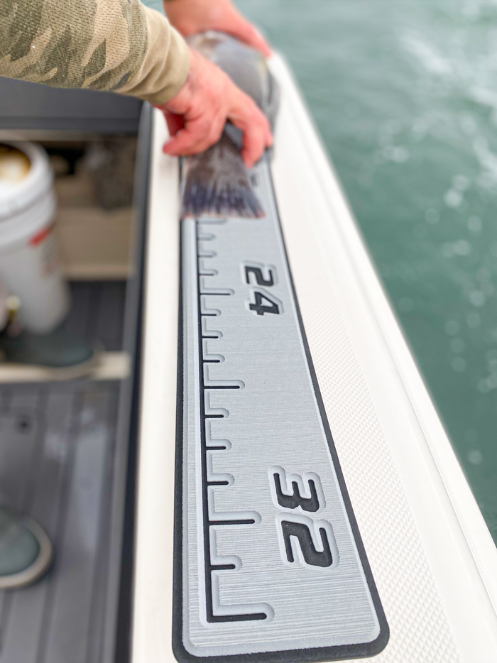 AquaGrip CT 36 inch EVA foam fish ruler — light gray over charcoal — installed on white boat gunwale