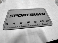 AquaGrip CT custom Sportsman laser-engraved cooler pad with fish ruler — medium gray over black — flat lay shop photo