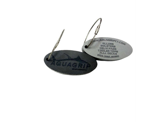AquaGrip Keychain — oval PE/EVA foam blend fob with engraved tuna logo on a stainless steel cable, front and back shown