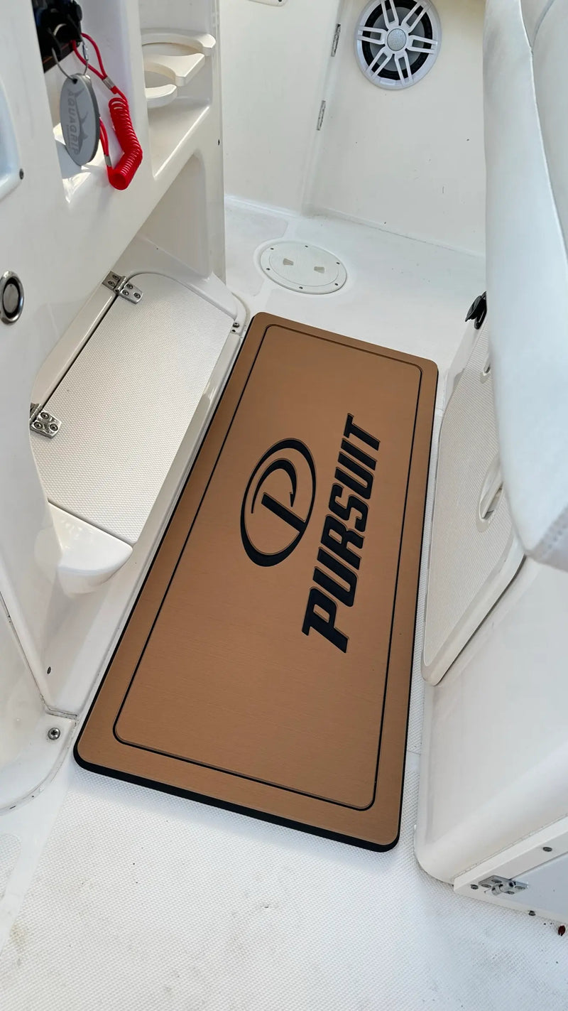 AquaGrip helm pad installed on boat console - teak over black