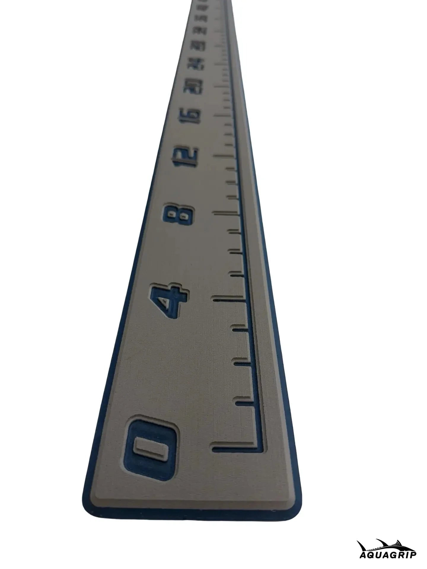 AquaGrip CT EVA foam fish ruler — medium gray over navy blue — angled studio shot close up
