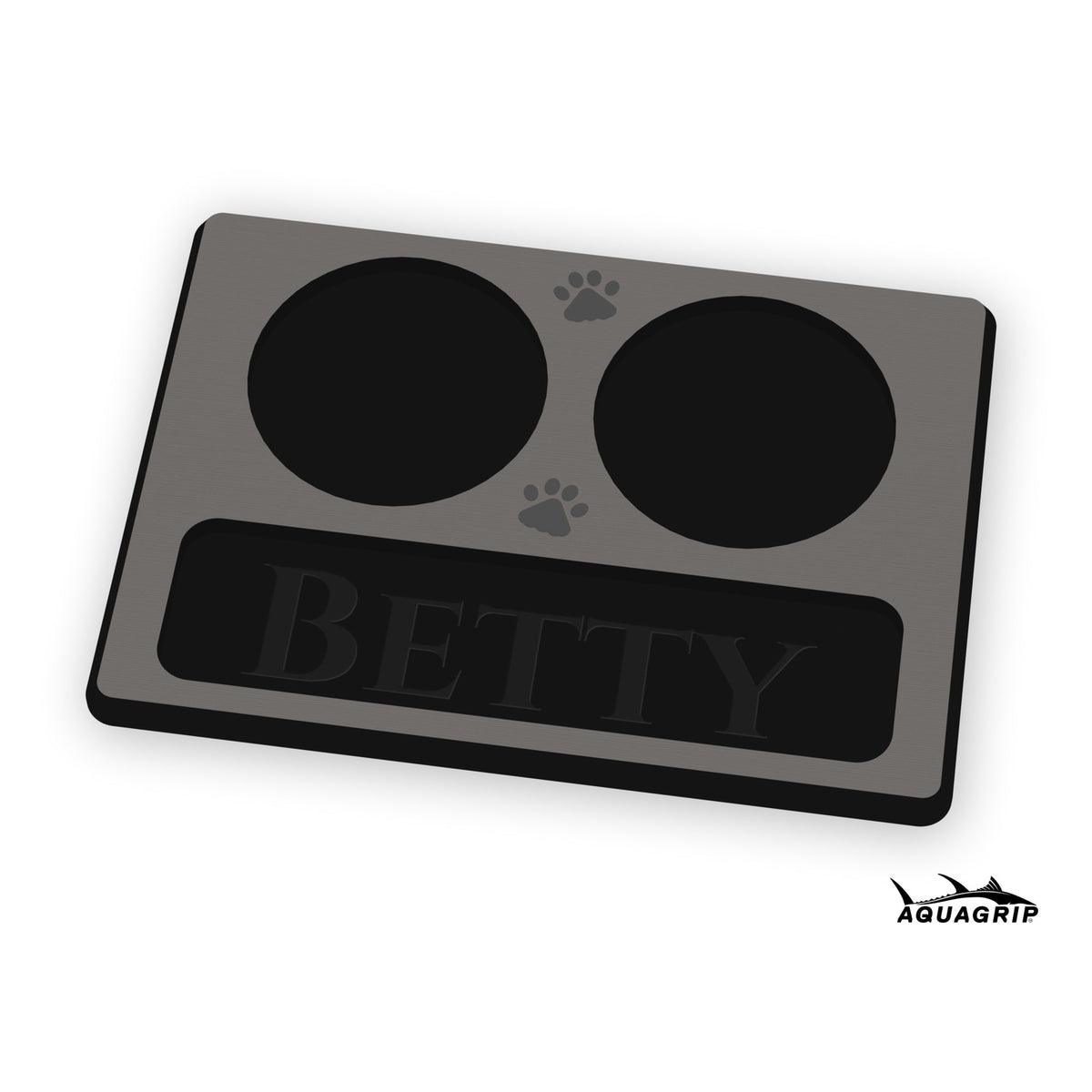 Custom AquaGrip dog bowl mat in medium gray over black: two bowl pockets, a drip tray with the name Betty, two paw prints