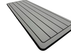AquaGrip EVA foam boat helm pad - medium gray over black teak lines design angled view