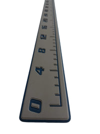 AquaGrip CT EVA foam fish ruler — medium gray over navy blue — angled studio shot close up
